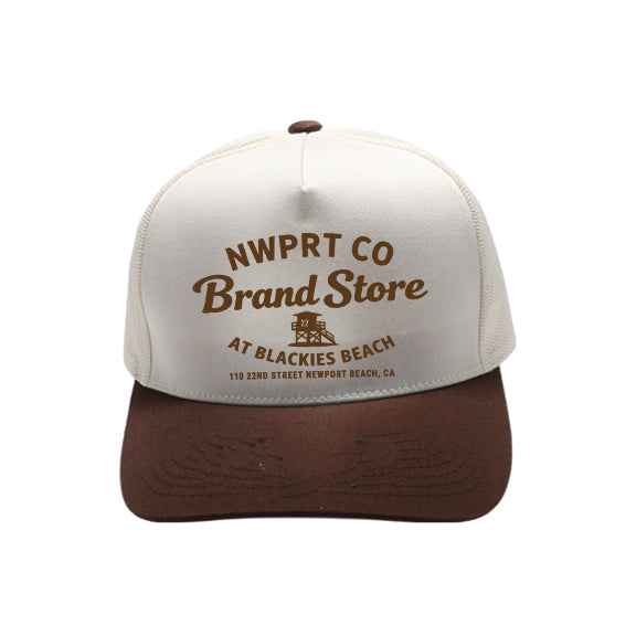 White and brown cap with 'NWPRT Co Brand Store logo